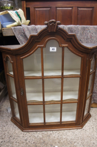 Appraisal: A wooden display cabinet glass doors and side panels cm