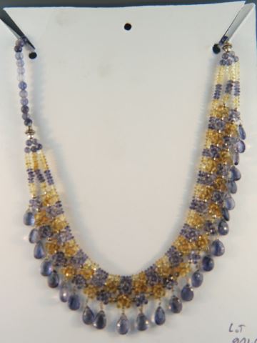 Appraisal: Sapphire Necklace blue yellow gems dangling briolettes sterling clasp