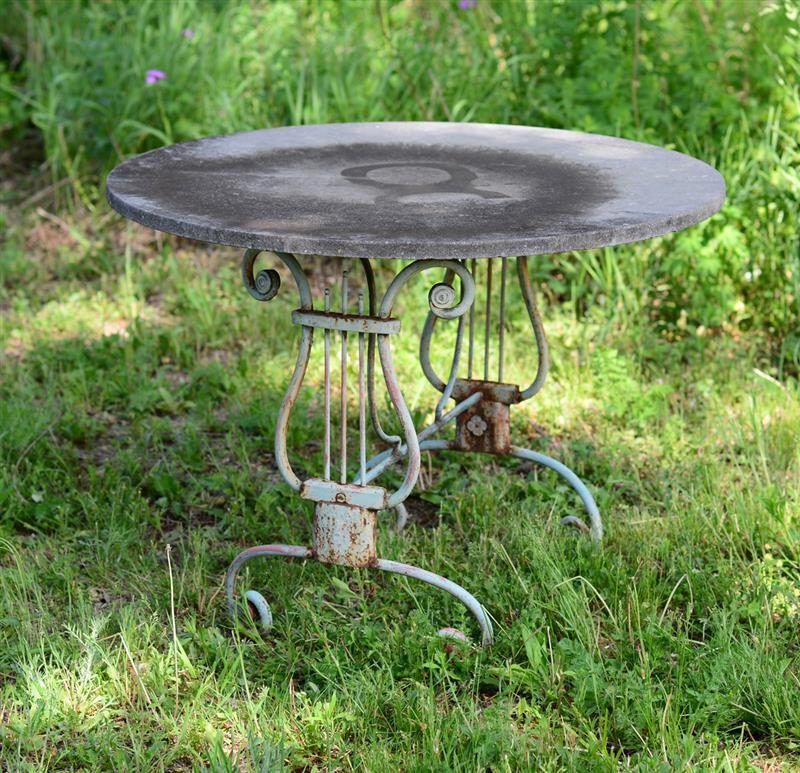 Appraisal: FRENCH PAINTED METAL AND CAST STONE GARDEN TABLE The circular