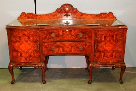 Appraisal: A reproduction sideboard in George I style in walnut veneer