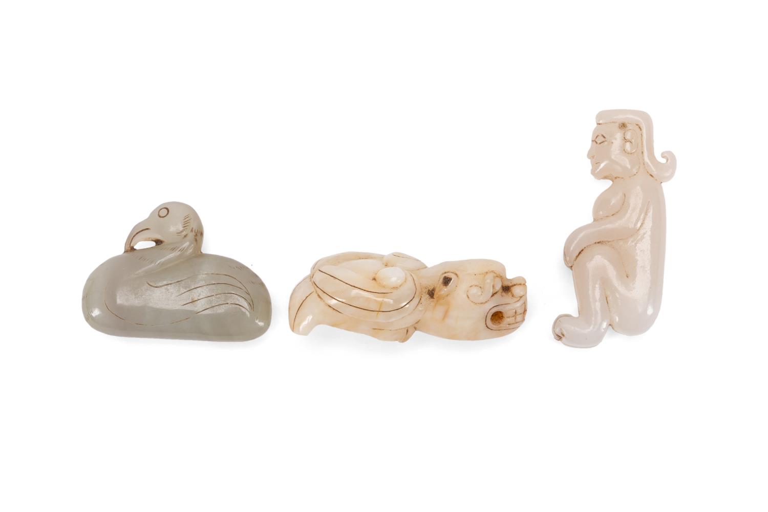 Appraisal: THREE CHINESE CARVED JADE PIECES Three Chinese carved jade pieces