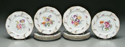 Appraisal: Set of Nymphenburg plates openwork scrolled borders hand painted floral