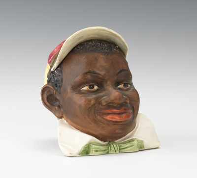 Appraisal: Black Americana Majolica Jockey Head Humidor Ceramic head with gloss