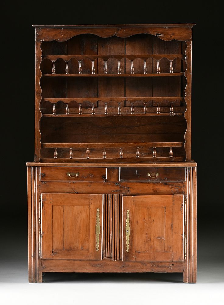 Appraisal: A RUSTIC FRENCH PROVINCIAL CHESTNUT BUFFET VASSELIER TH TH CENTURIES