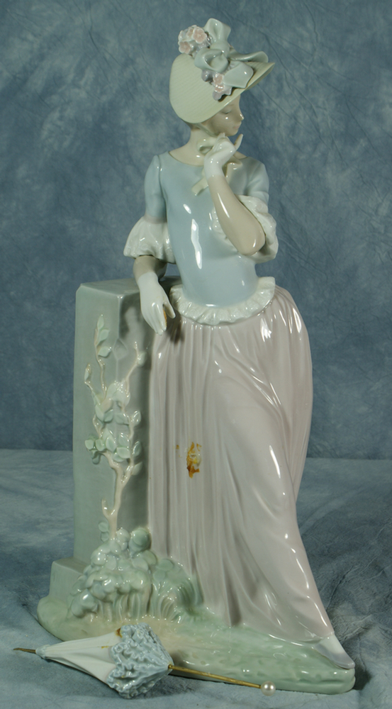 Appraisal: Lladro figurine woman holding an umbrella umbrella needs to be