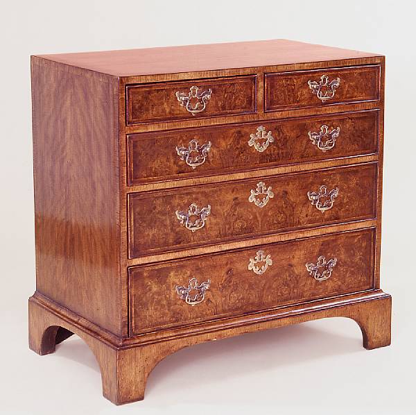 Appraisal: A George I style walnut chest of drawers Overall with