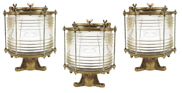 Appraisal: A group of three brass ship's lamps height in