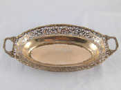 Appraisal: A small two handled oval silver standard dish with pierced