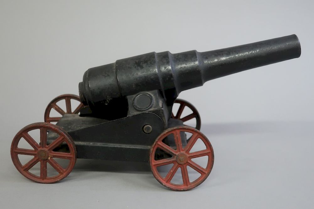 Appraisal: Metal Toy Cannon on Wheels Metal toy cannon on wheels