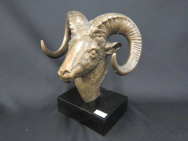 Appraisal: Bronze Statue of a Ram's Head curved horns plus black