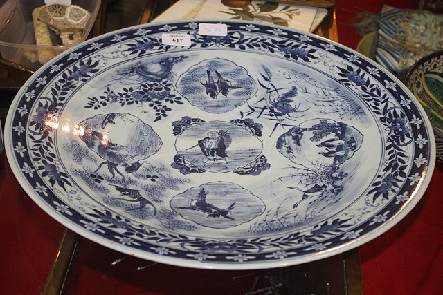 Appraisal: A CHINESE BLUE AND WHITE PORCELAIN CHARGER central figure within