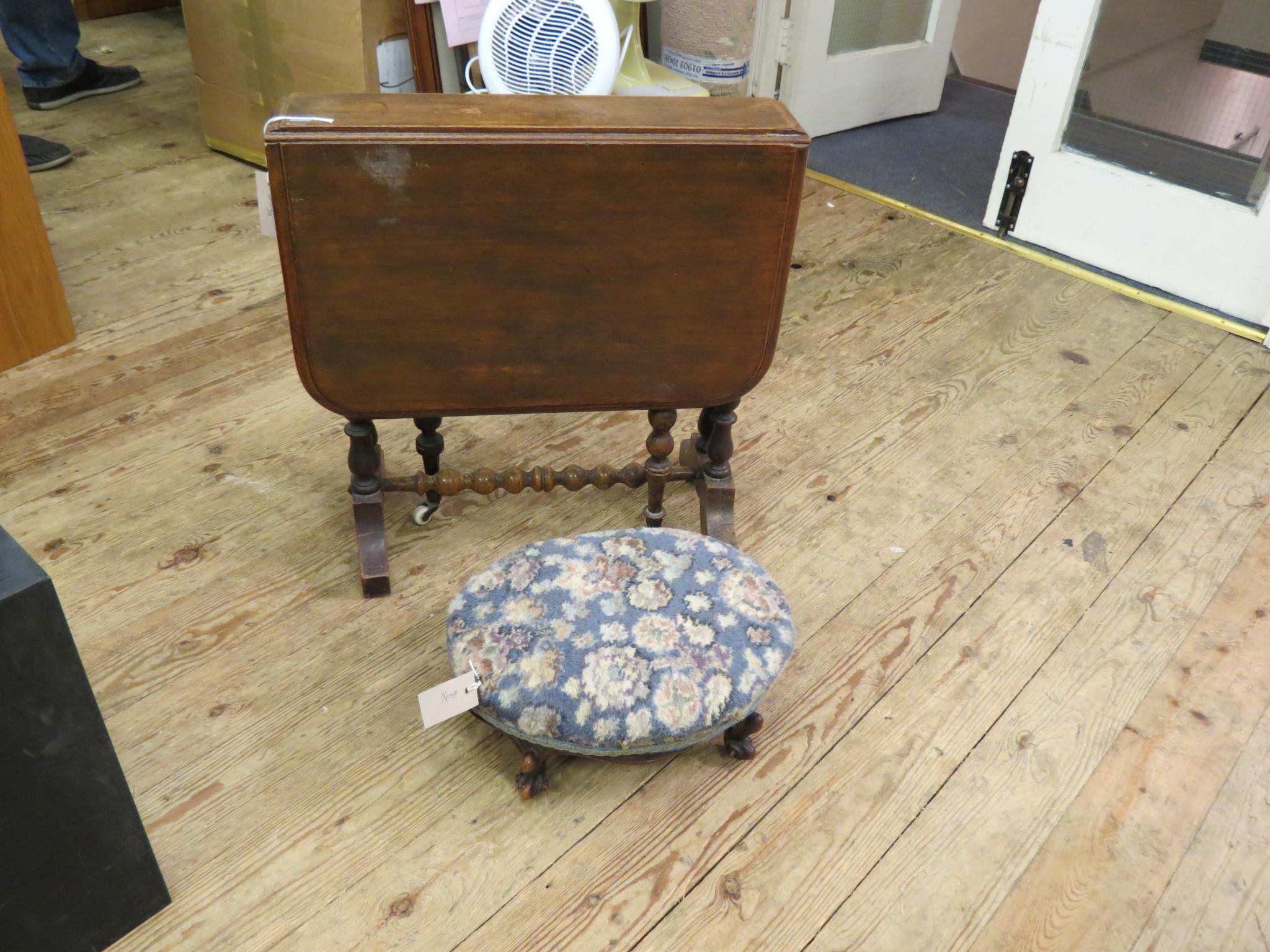 Appraisal: A Victorian walnut Sutherland table on ball-turned underframe ft in