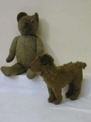 Appraisal: An early th century English teddy bear straw filled covered