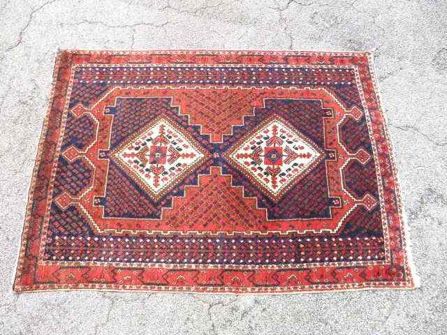 Appraisal: Small wool oriental style carpet Colors of blue white black