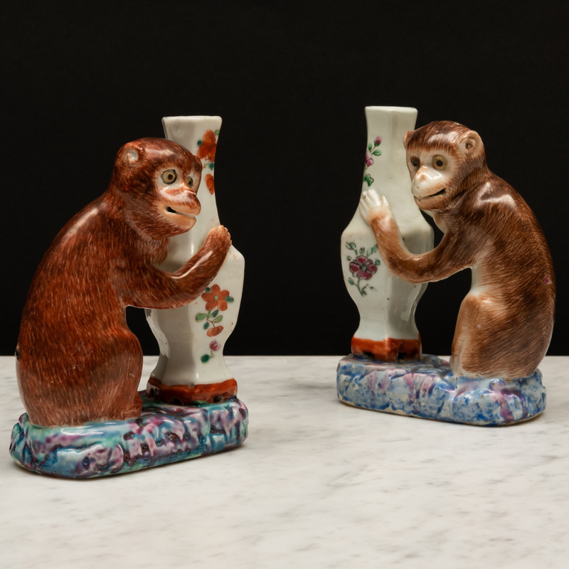 Appraisal: Pair of Chinese Export Porcelain Models of Monkeys with Vases