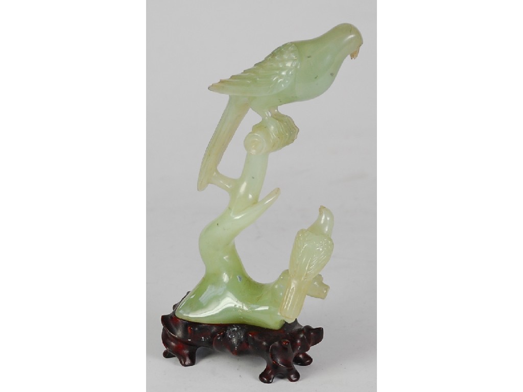 Appraisal: CHINESE CARVED GREEN JADE GROUP of two perched birds cm