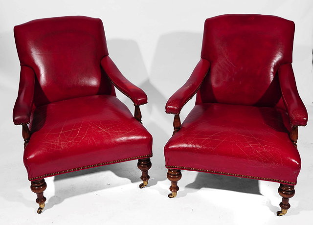 Appraisal: A PAIR OF AMERICAN TH CENTURY STYLE LIBRARY ARMCHAIRS by