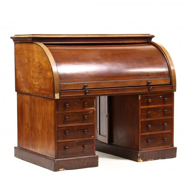 Appraisal: GEORGE III MAHOGANY C-SCROLL DESK Early th century mahogany veneer