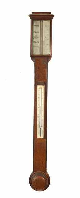 Appraisal: A VICTORIAN POLLARD OAK STICK BAROMETER the rectangular two piece