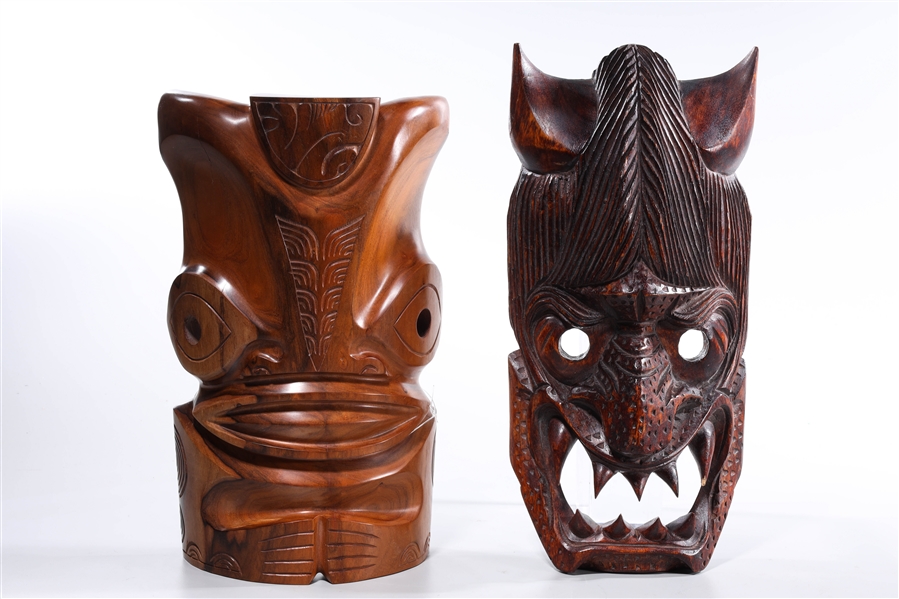 Appraisal: Two Pacific Island carved masks including a Philippines and tiki-style