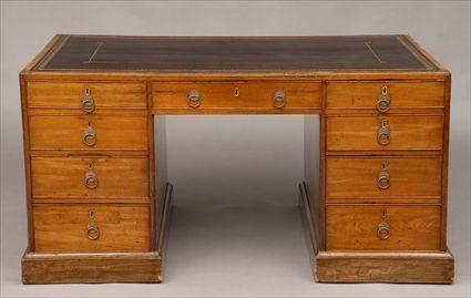 Appraisal: GEORGE III MAHOGANY KNEEHOLE DESK The gold-tooled brown leather top