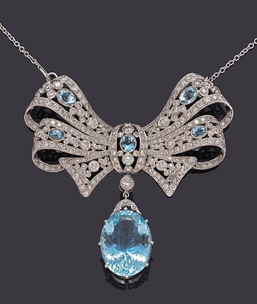 Appraisal: An aquamarine and diamond brooch-pendant-necklace with removable drop and chain