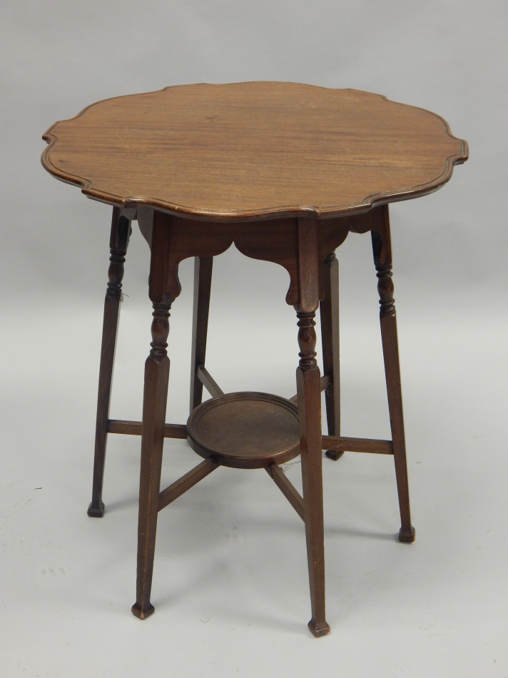 Appraisal: A late th early thC aesthetic style walnut occasional table