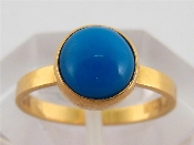 Appraisal: An Egyptian gold and blue stone ring the shank with