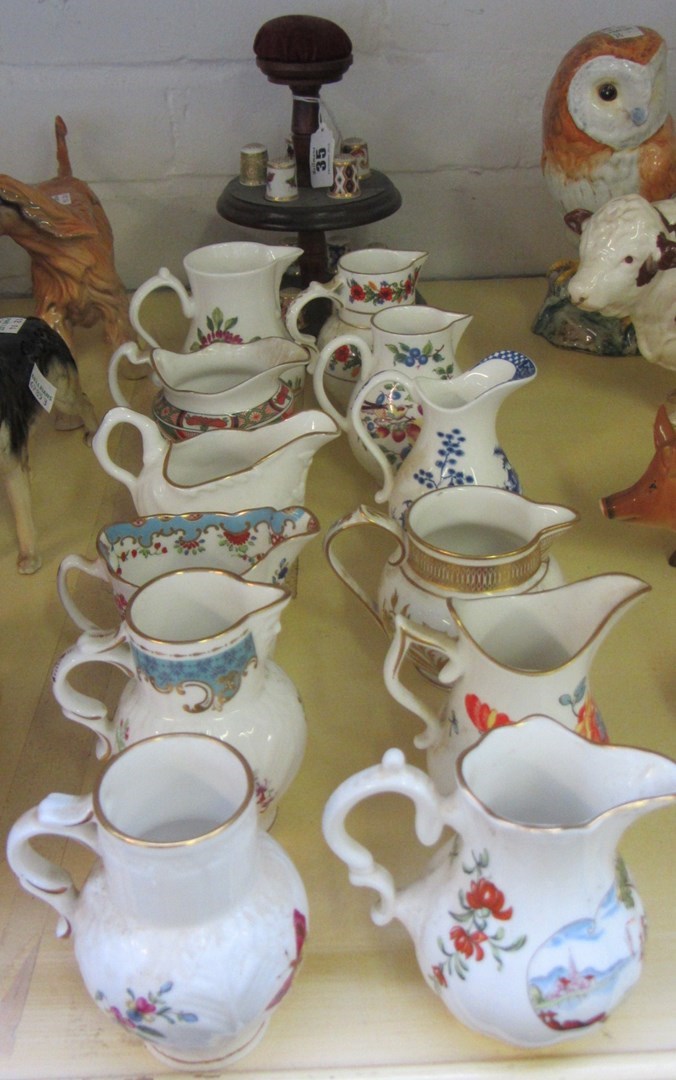 Appraisal: Twelve modern porcelain Royal Worcester jugs commemorating Worcester's range cm