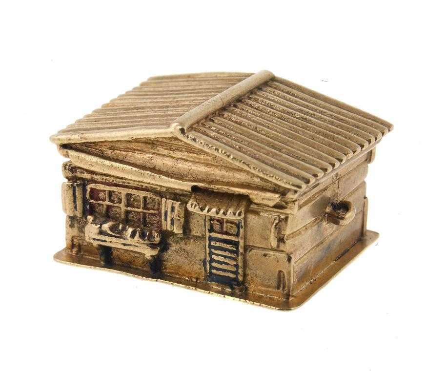 Appraisal: A CT GOLD SWISS CHALET NOVELTY MINIATURE MUSICAL BOX cm