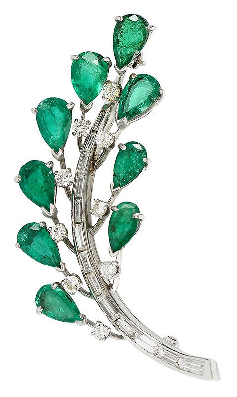 Appraisal: Platinum Emerald and Diamond Brooch nine pear cut emeralds estimated