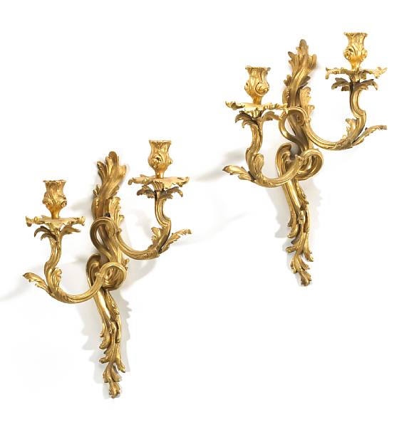 Appraisal: A pair of Louis XV style gilt bronze two light