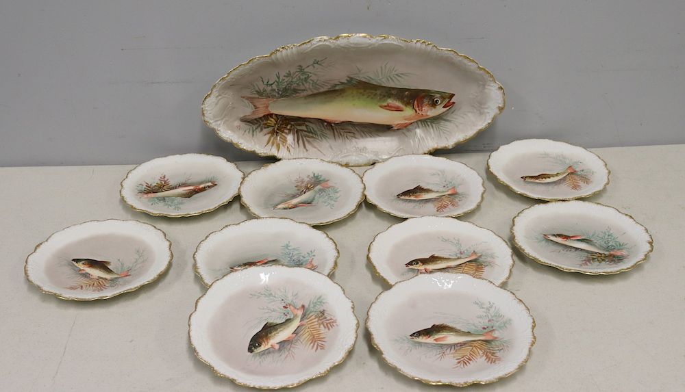 Appraisal: Limoges Porcelain Fish Platter And Plates A fish decorated and