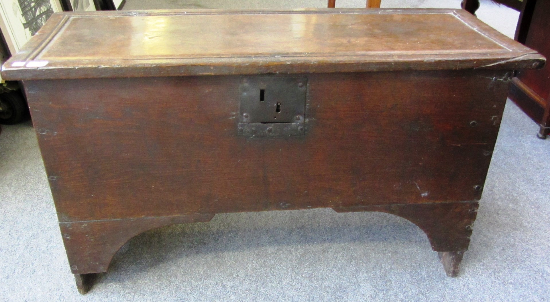 Appraisal: A th century oak five plank coffer on slab end