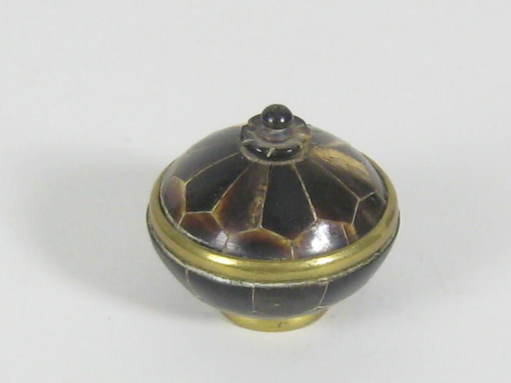 Appraisal: A circular Pill Box with horn marquetry veneer and brass