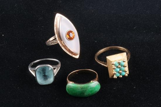 Appraisal: FOUR ASSORTED GOLD AND GEMSTONE RINGS Including textured panel with