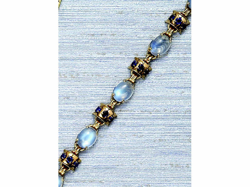 Appraisal: MOONSTONE AND SAPPHIRE BRACELET k yellow gold retro bracelet set