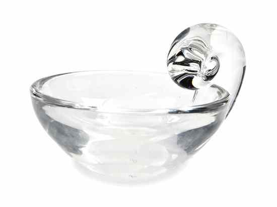 Appraisal: A Steuben Glass Bowl having an applied scrolling handle signed