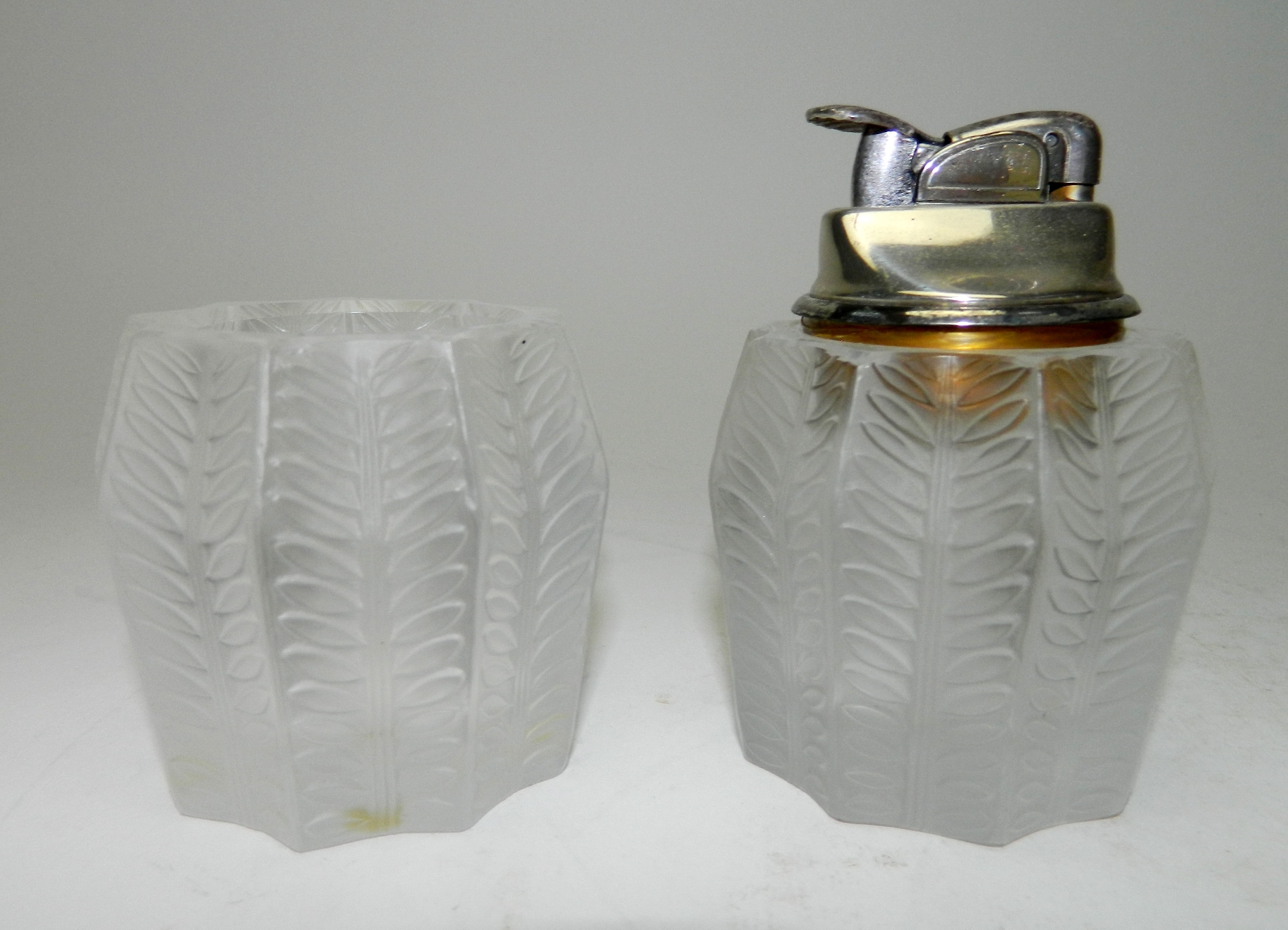 Appraisal: Lalique crystal 'Jamaique' cigarette lighter and cigarette cup barrel form