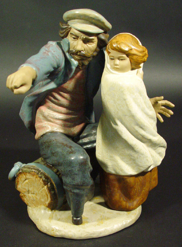 Appraisal: Nao porcelain figure group of a sailor and child with