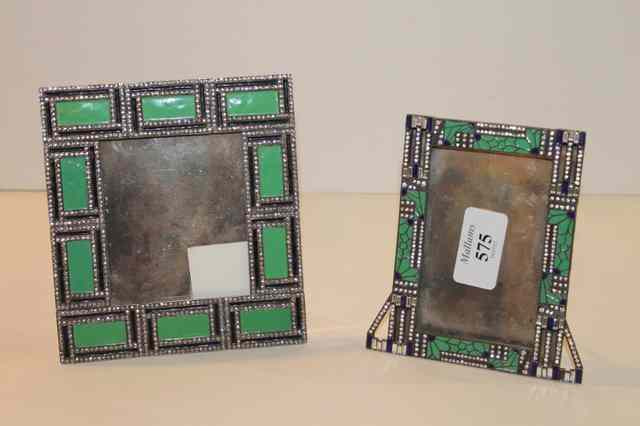 Appraisal: TWO FRENCH ART DECO ENAMELLED AND COLOURED STONE PHOTO FRAMES