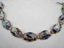 Appraisal: An enamel on silver bracelet decorated with Viking ships etc