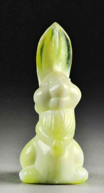 Appraisal: Molded Glass Slag Glass RabbitUpright bunny in white to yellow