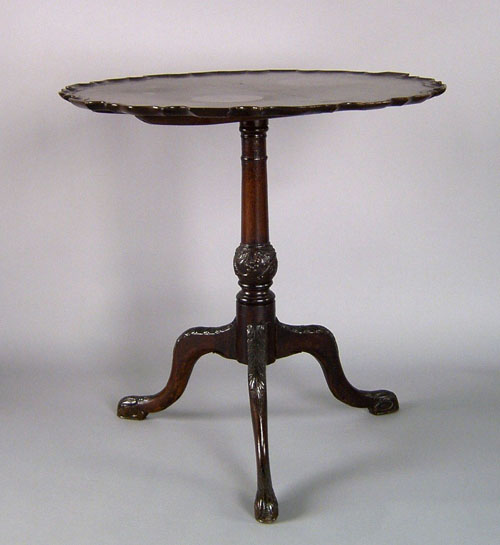 Appraisal: George II oak tea table ca the piecrust top tilting