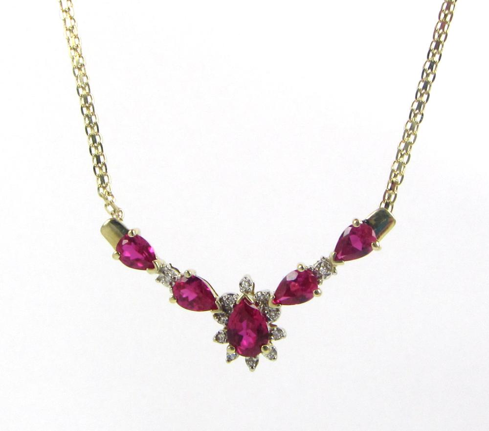 Appraisal: SYNTHETIC RUBY AND DIAMOND NECKLACE The k yellow and white