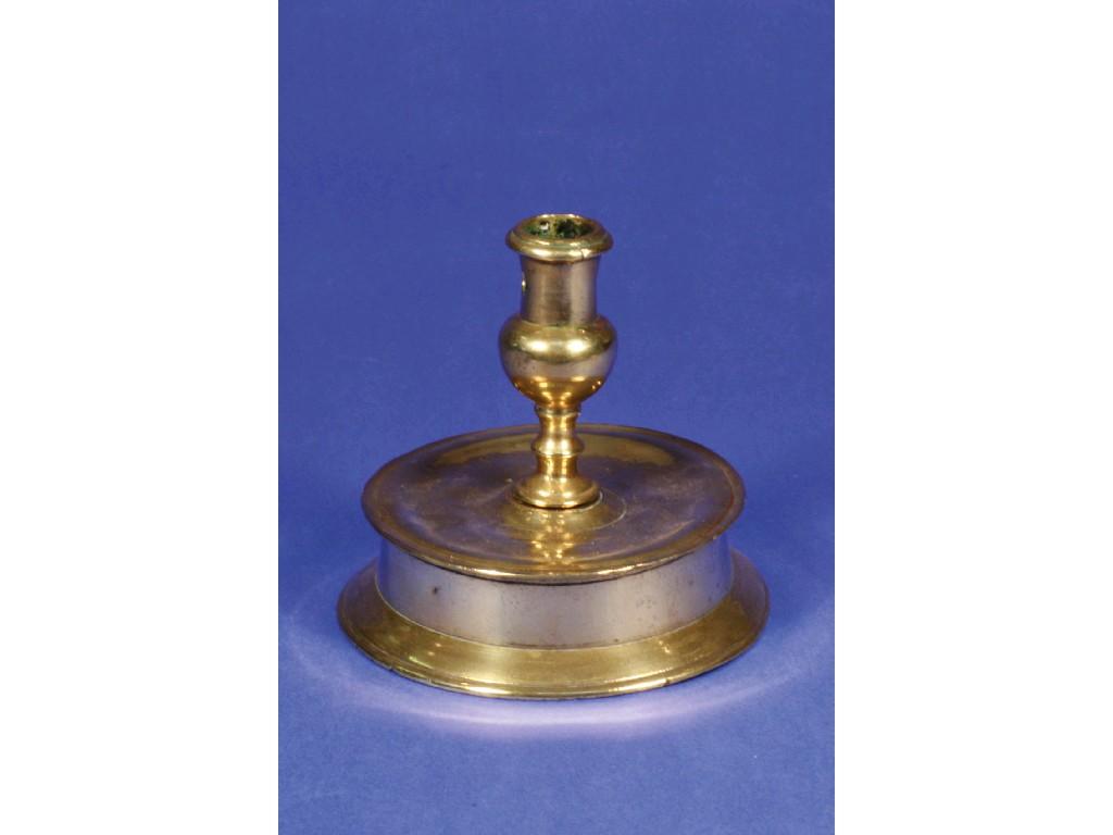 Appraisal: AN EARLY TH CENTURY BRASS CANDLESTICK with a socket-shaped sconce