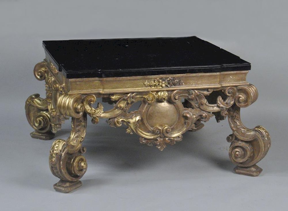 Appraisal: Italianate Style Carved Gilded M T Low Table with elaborately