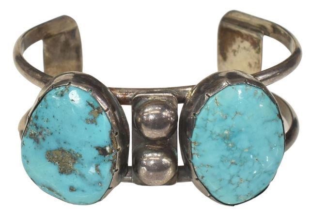 Appraisal: Native American silver content unknown cuff bracelet with two bezel-set