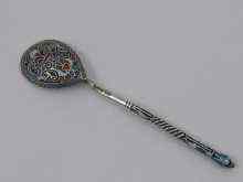 Appraisal: A cloisonne enamelled Russian silver tea spoon with gilt bowl