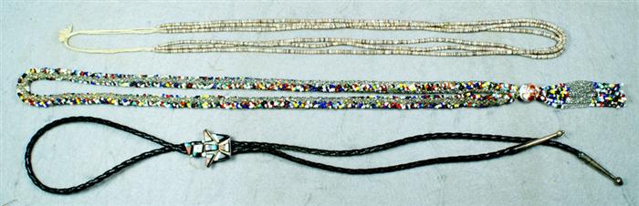 Appraisal: Native American necklaces Clear and colored braided beaded necklace with